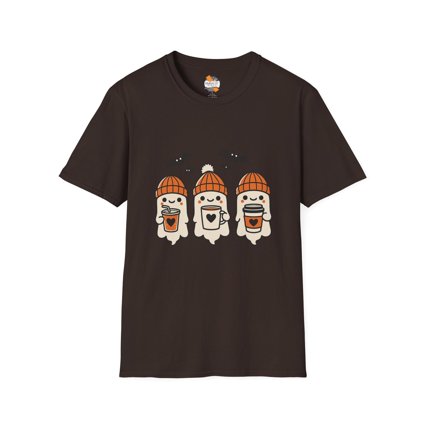 Dark brown unisex shirt featuring kawaii-style Halloween ghosts in orange beanies, each holding a coffee cup, with flying bats overhead – designed by Makin’ It By Lady Ev