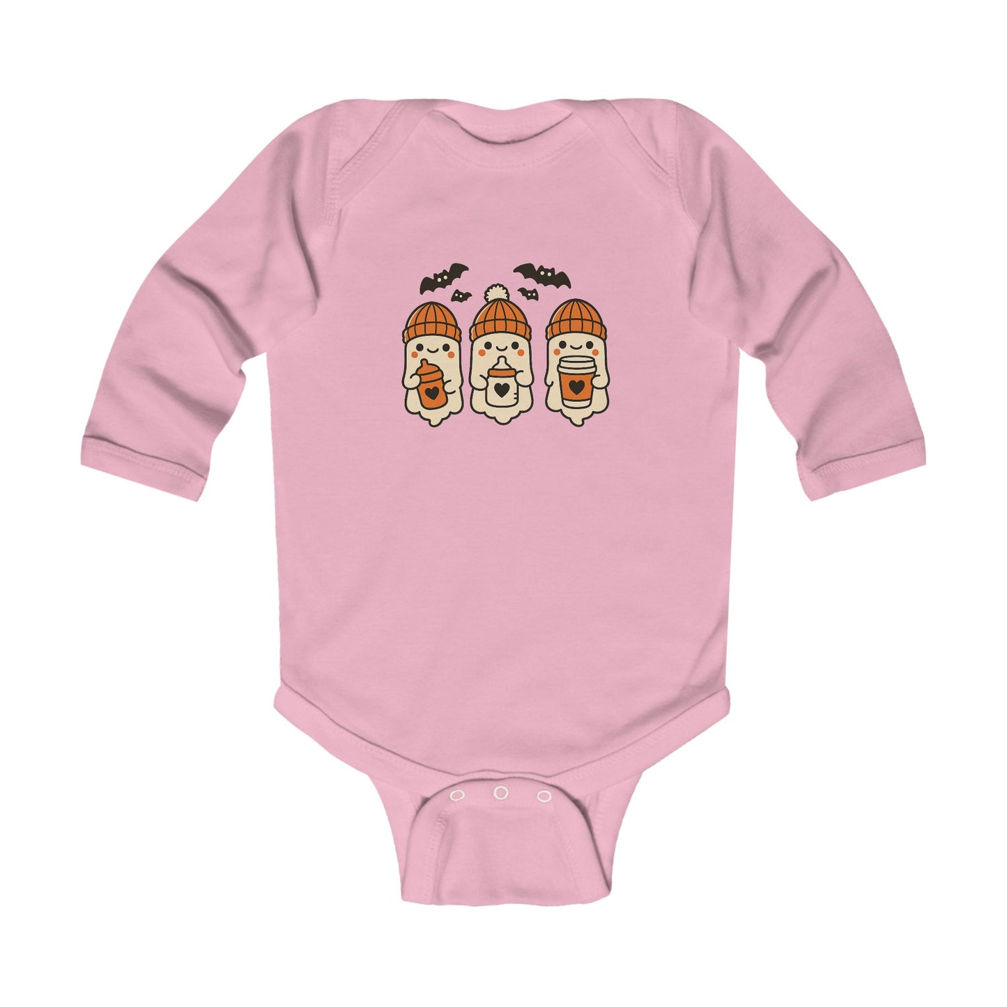 Soft pink baby onesie featuring cute ghost trio in orange winter beanies, each holding a baby bottle or sippy cup, surrounded by flying bats.