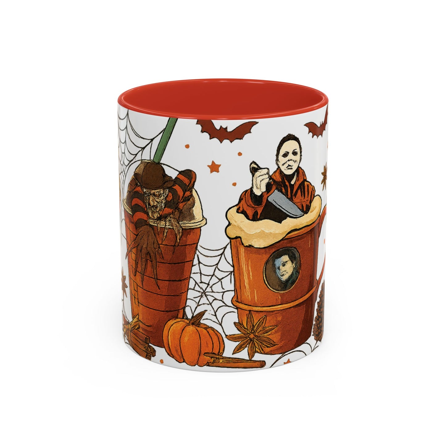 Horror coffee mug with red interior showing Freddy Krueger and Michael Myers in spooky drink artwork with pumpkins and spider webs.