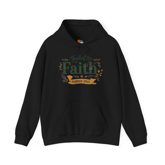 Black “Fueled by Faith & Pumpkin Spice” hoodie — cozy unisex Christian fall sweatshirt with green and gold faith design by Makin’ It By Lady Ev.