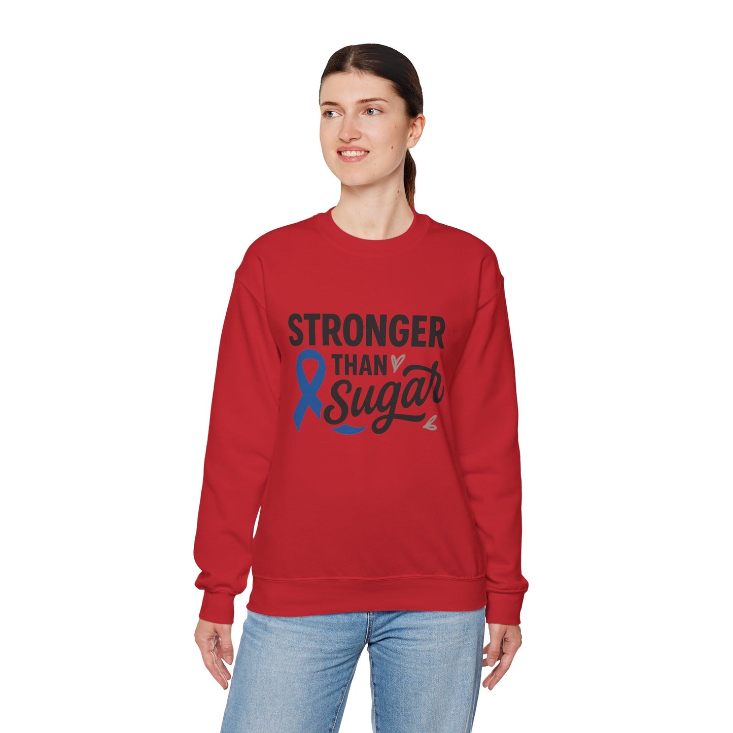 Female model in red Stronger Than Sugar crewneck sweatshirt β soft fleece awareness apparel promoting diabetes education and resilience.