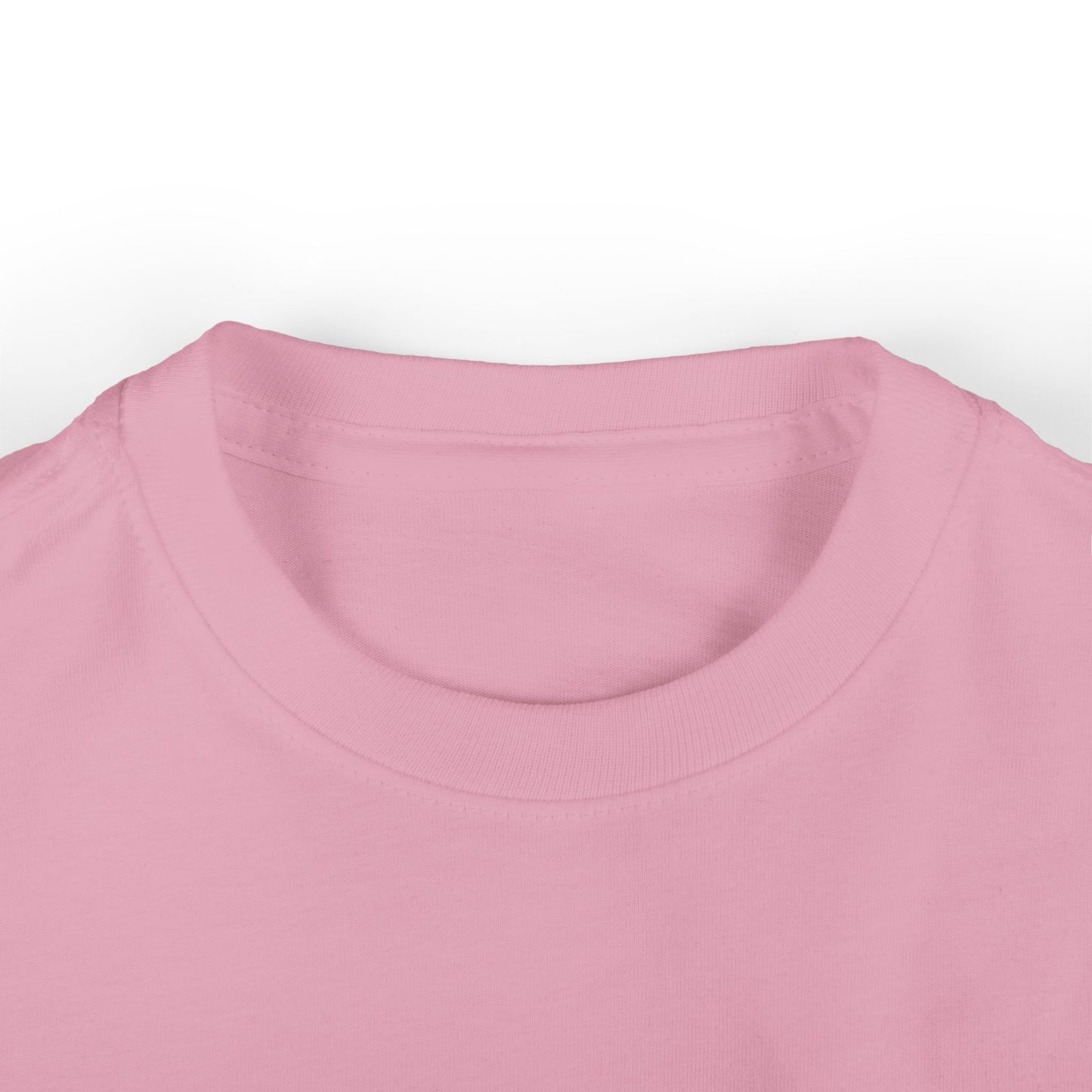 Close up of toddler girls’ light pink cotton t-shirt collar, soft crewneck design for everyday wear