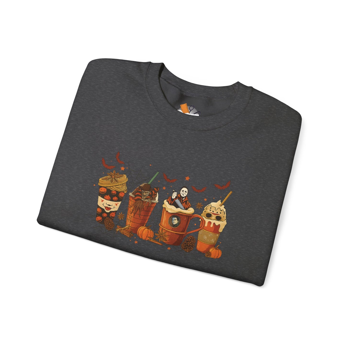 Folded dark heather gray Gildan 18000 crewneck sweatshirt with spooky Halloween horror coffee drinks graphic featuring characters and bats.