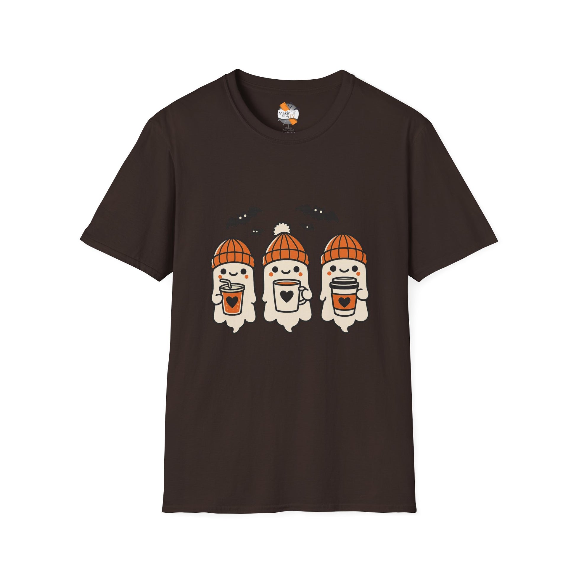 Dark brown unisex shirt featuring kawaii-style Halloween ghosts in orange beanies, each holding a coffee cup, with flying bats overhead – designed by Makin’ It By Lady Ev