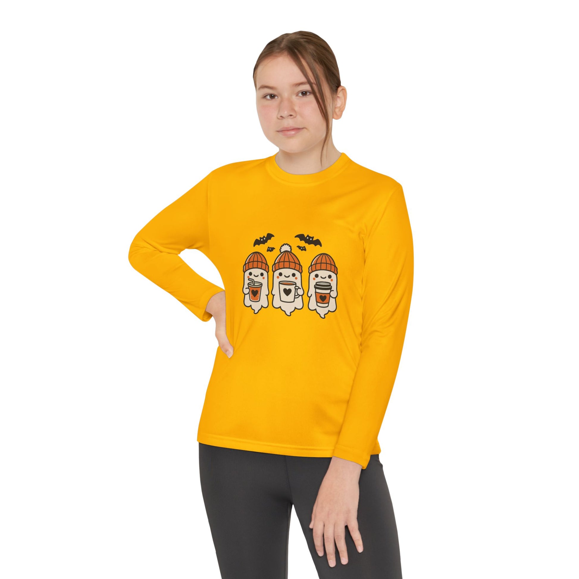 Young Female model wearing gold ghost beanie Halloween long sleeve shirt – festive unisex tee by Makin’ It By Lady Ev.