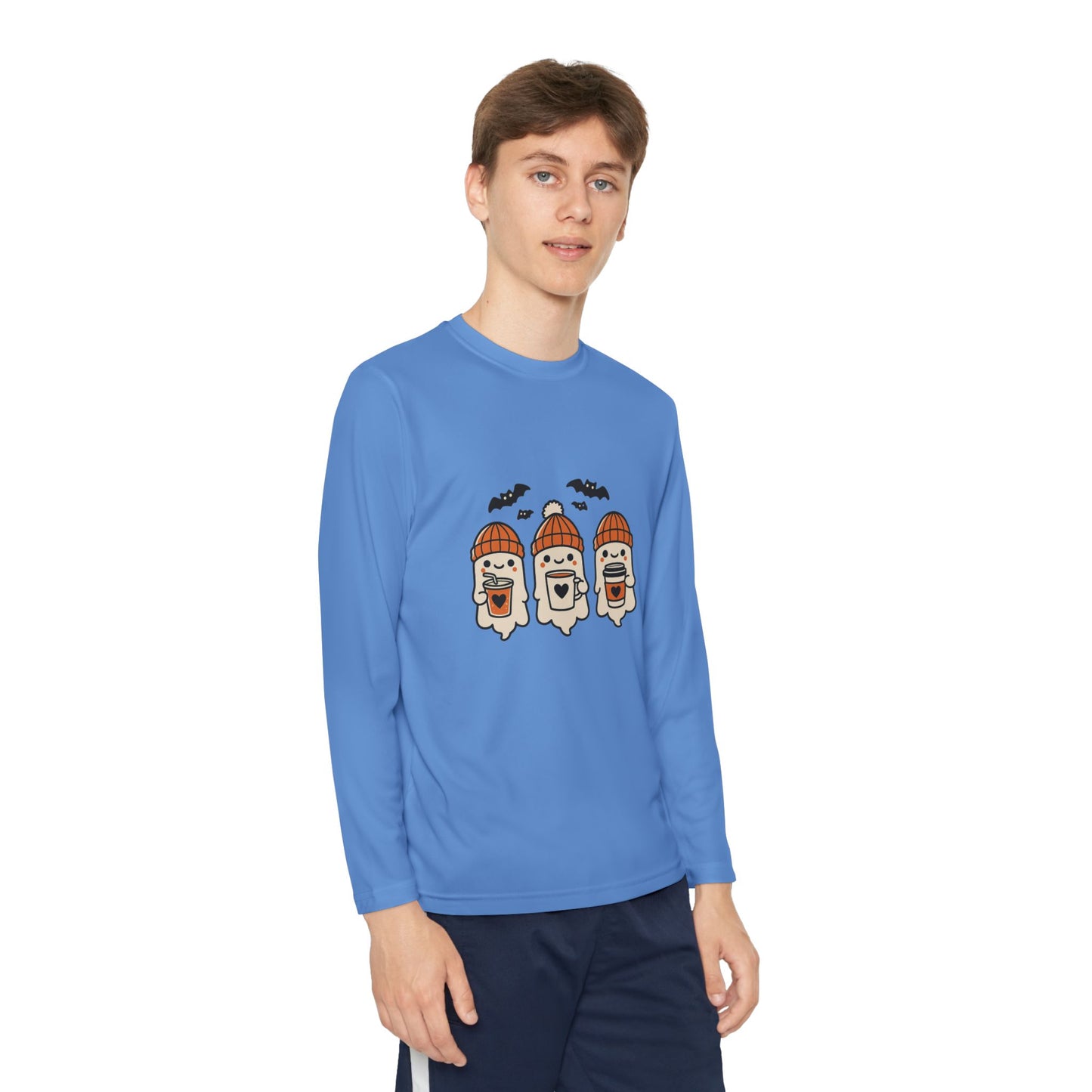 Young Man wearing light blue long sleeve Halloween shirt with three adorable ghosts in orange beanies holding coffee mugs, surrounded by bats.
