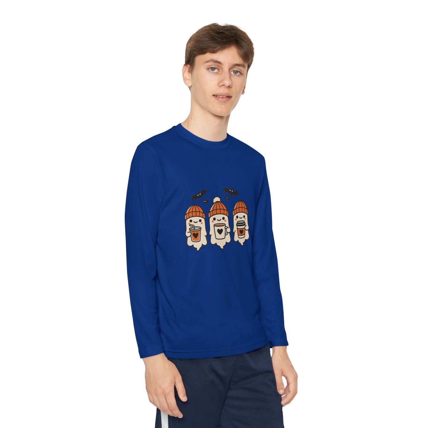 young male wearing royal blue long sleeve Halloween shirt with three cute ghosts in orange knit hats holding coffee mugs, surrounded by bats.