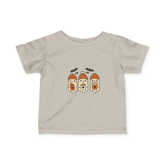Heather oatmeal toddler Halloween tee featuring three kawaii ghosts in orange knit beanies holding drinks with bats.