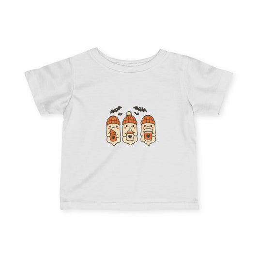 White toddler Halloween t-shirt with three cute ghosts in orange beanies holding cups, bats above design.