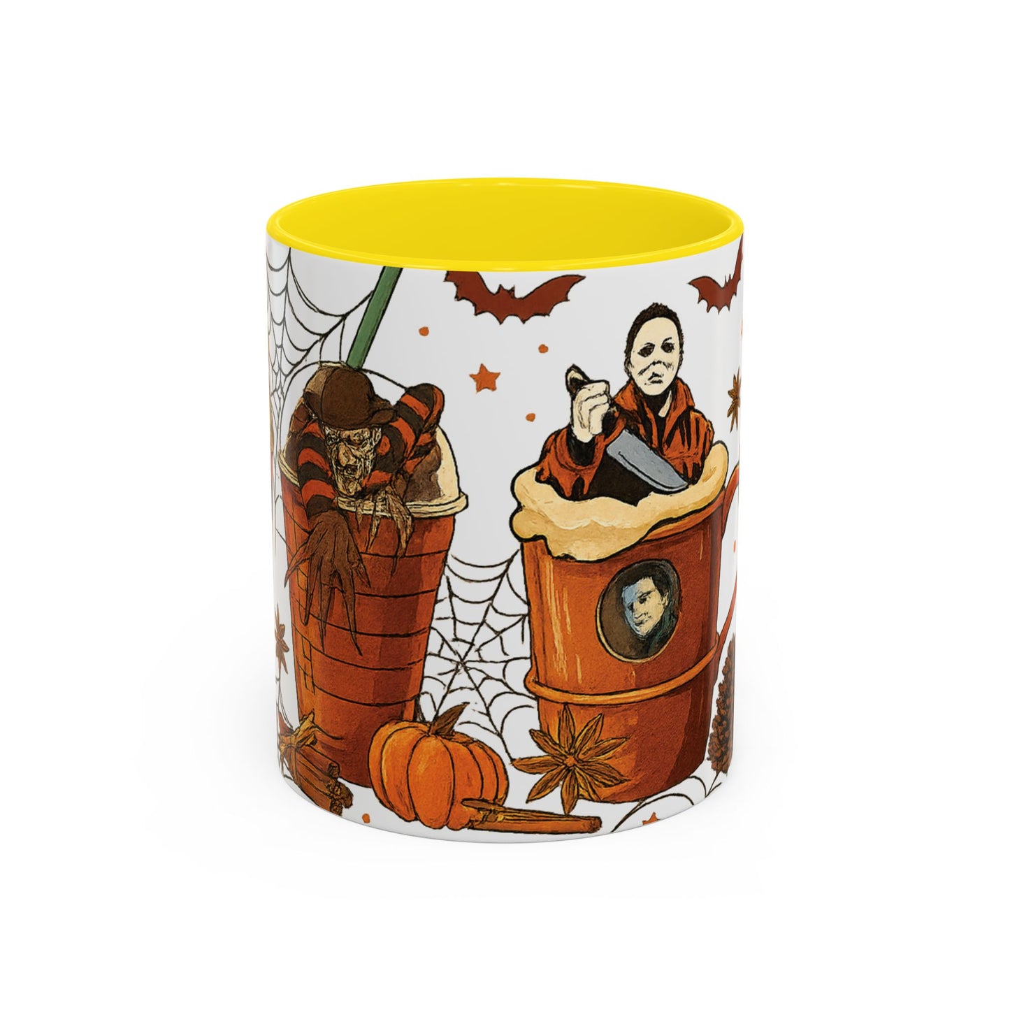 Halloween horror coffee mug with yellow interior featuring Freddy Krueger and Michael Myers in spooky drink design with pumpkins and cobwebs.