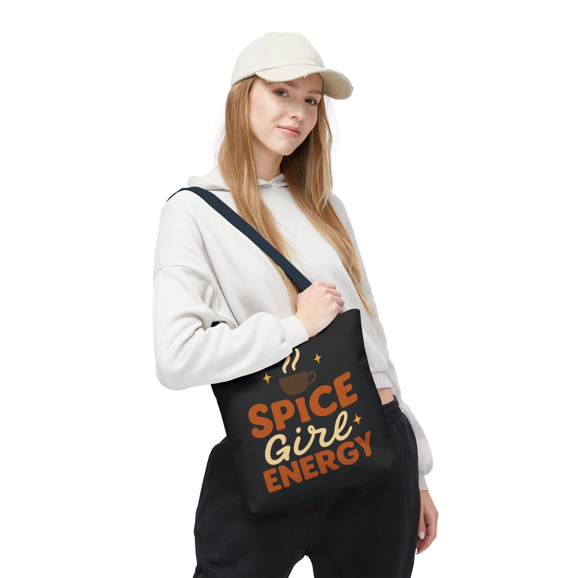 Model wearing black “Spice Girl Energy” tote bag with navy straps — chic coffee-inspired tote for everyday autumn wear.