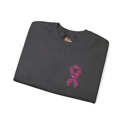 Folded charcoal gray crewneck sweatshirt with pink heart ribbon design for breast cancer awareness, Makin’ It by Lady Ev.