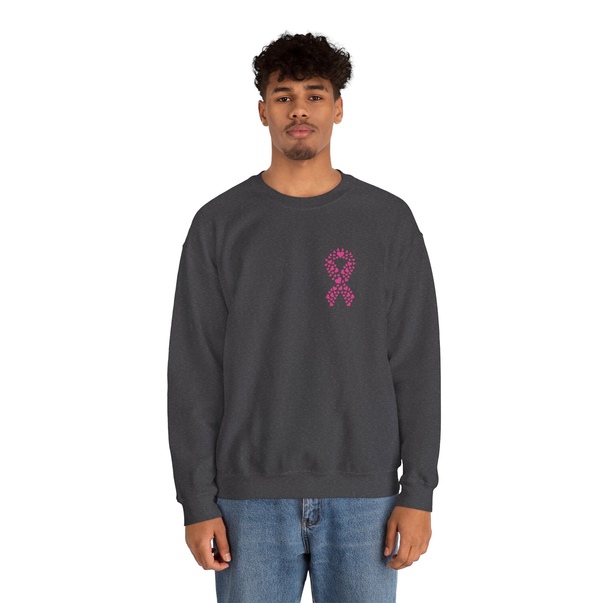 Man wearing charcoal gray breast cancer awareness crewneck sweatshirt with pink ribbon of hearts design, Makin’ It by Lady Ev.