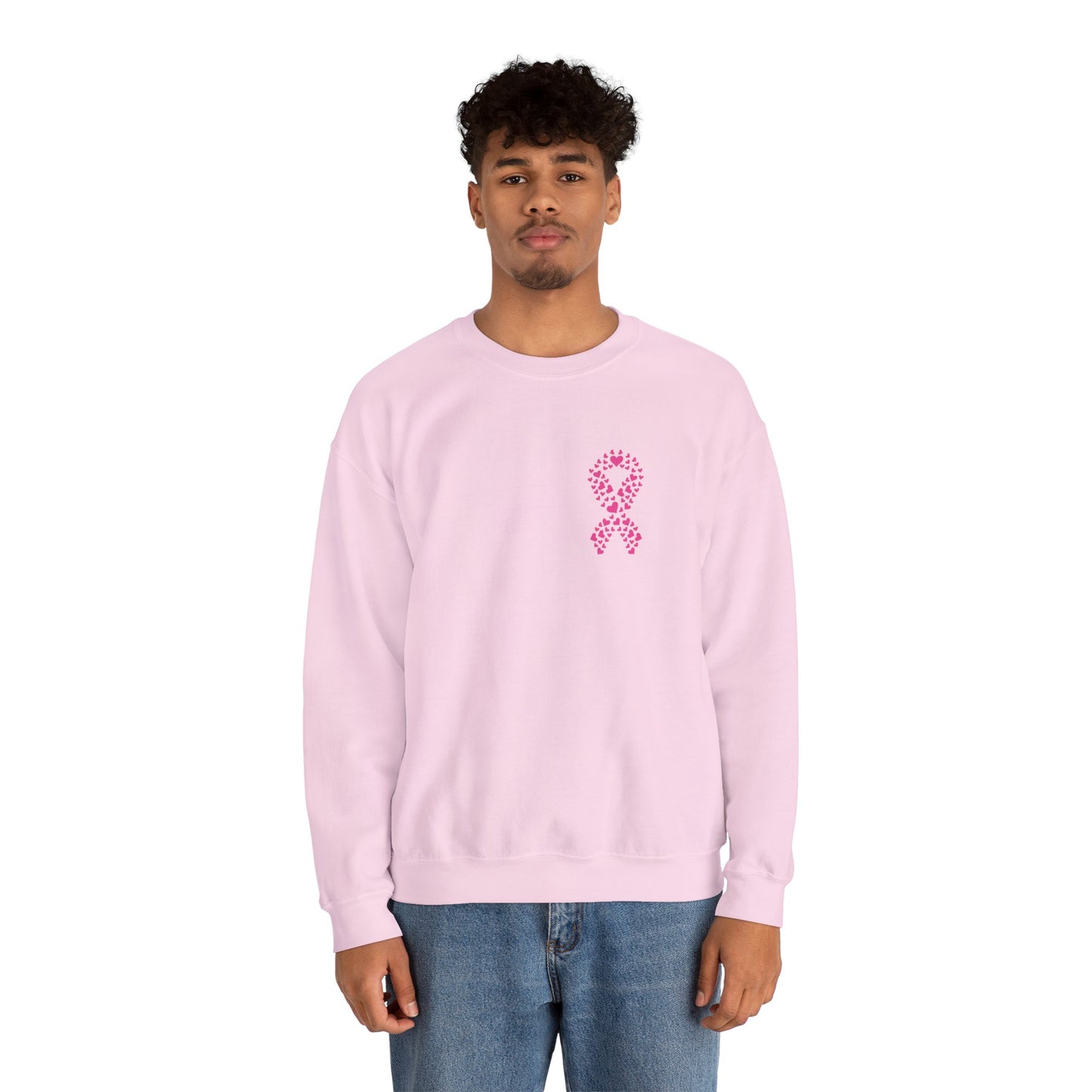 Man wearing light pink breast cancer awareness crewneck sweatshirt with pink ribbon made of hearts, Makin’ It by Lady Ev.