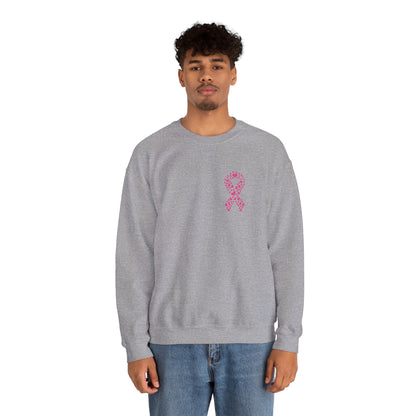Man wearing sport gray breast cancer awareness crewneck sweatshirt with pink heart ribbon design, Makin’ It by Lady Ev.