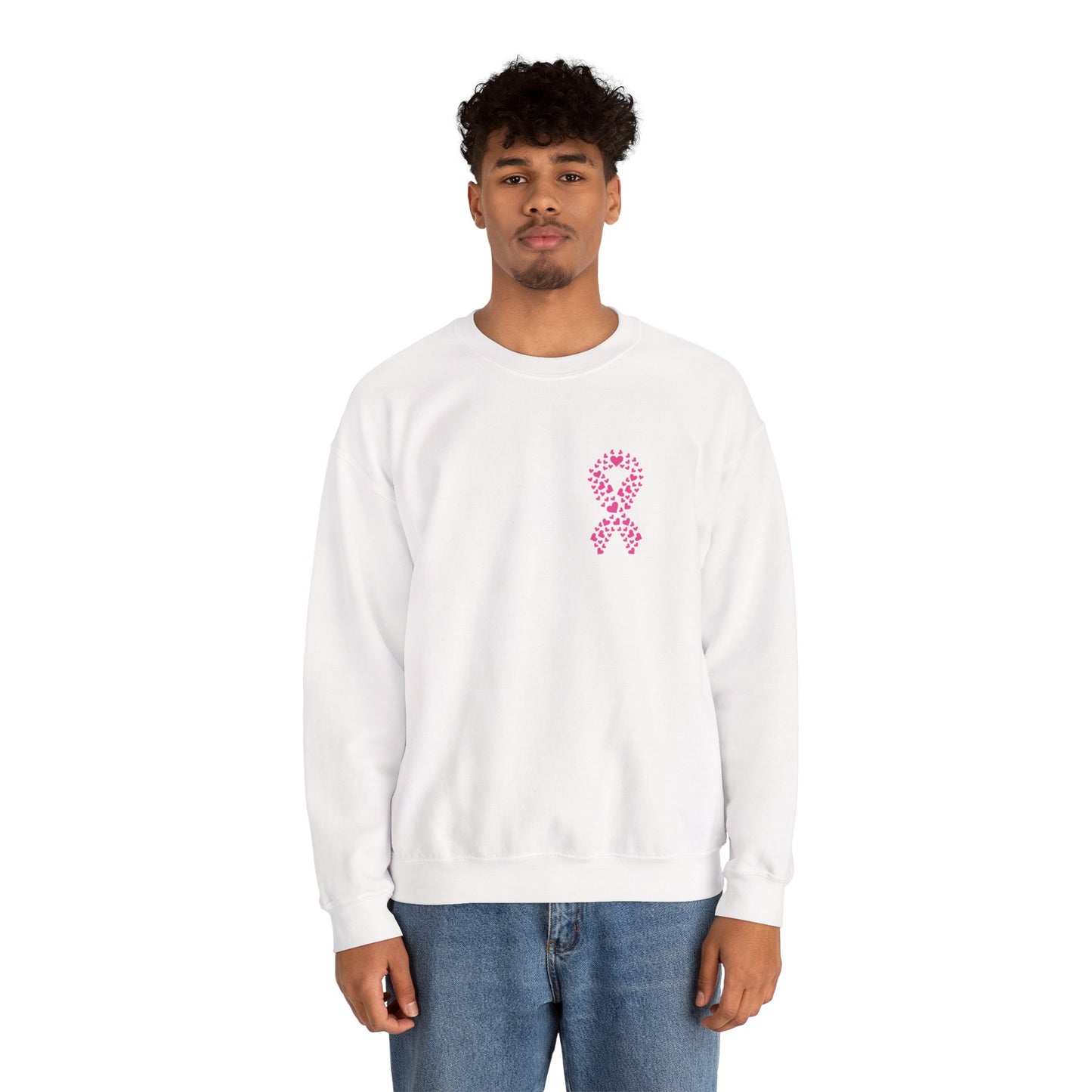 Man wearing white breast cancer awareness crewneck sweatshirt with pink heart ribbon design, Makin’ It by Lady Ev.