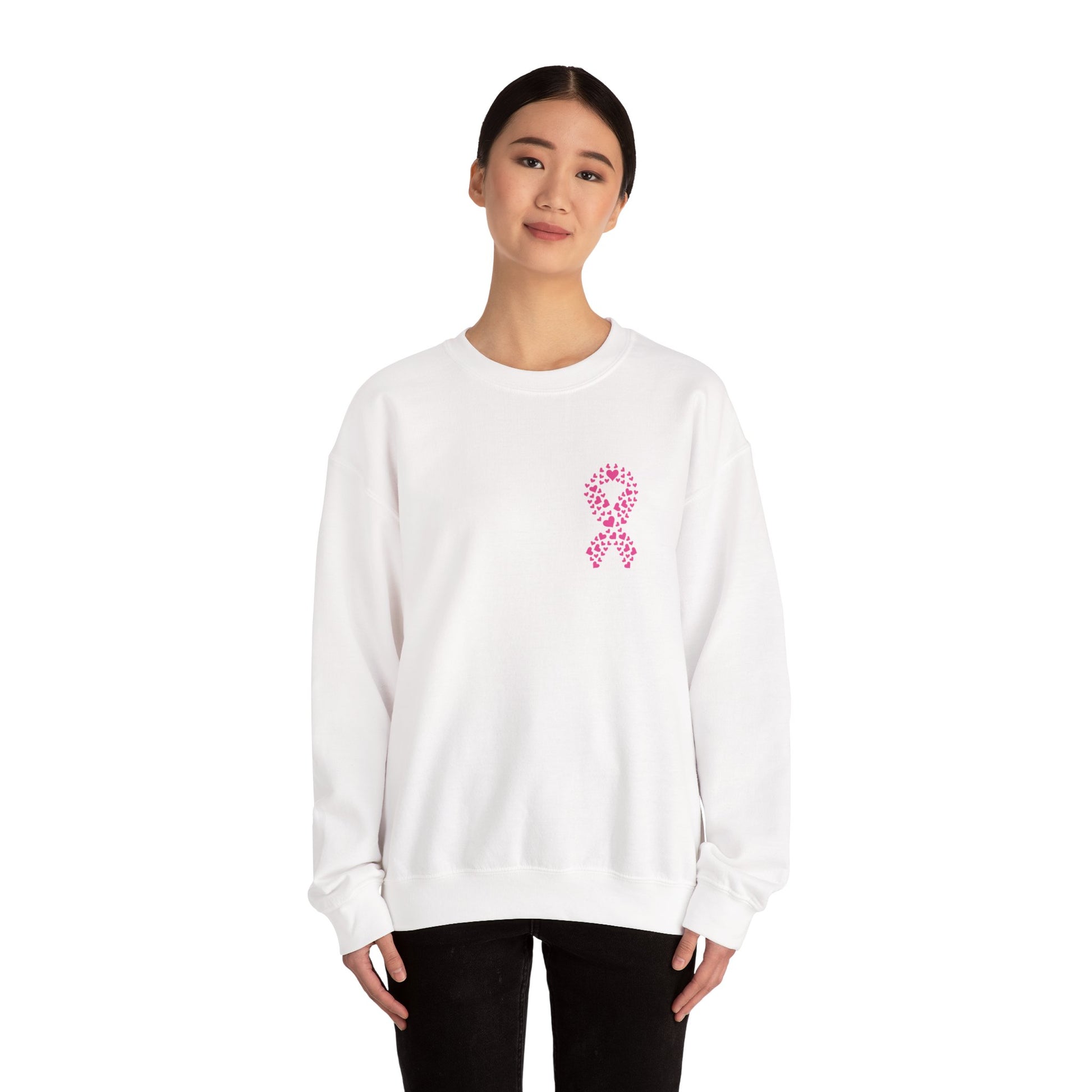 Woman wearing white breast cancer awareness crewneck sweatshirt with pink ribbon made of hearts, Makin’ It by Lady Ev.