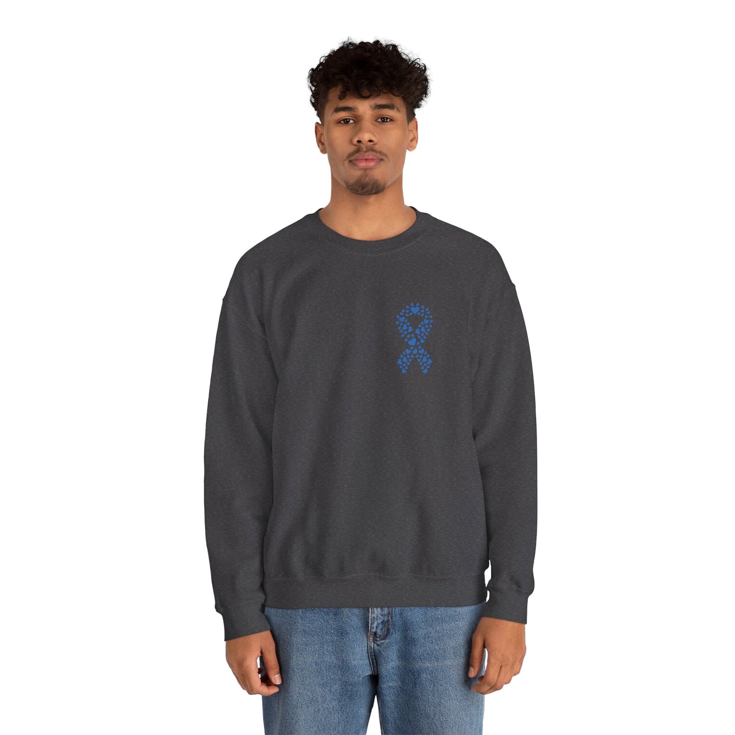 Man modeling dark heather gray diabetes awareness sweatshirt — classic unisex crewneck with blue heart ribbon emblem for awareness.