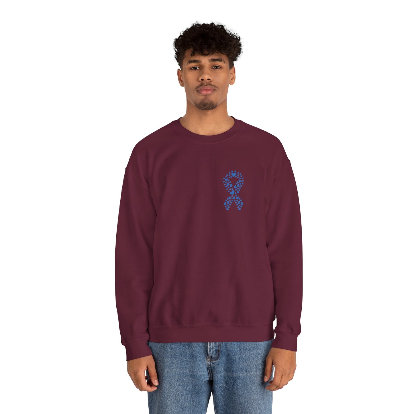Man modeling maroon diabetes awareness crewneck sweatshirt — unisex sweatshirt with blue heart ribbon design supporting awareness and care.