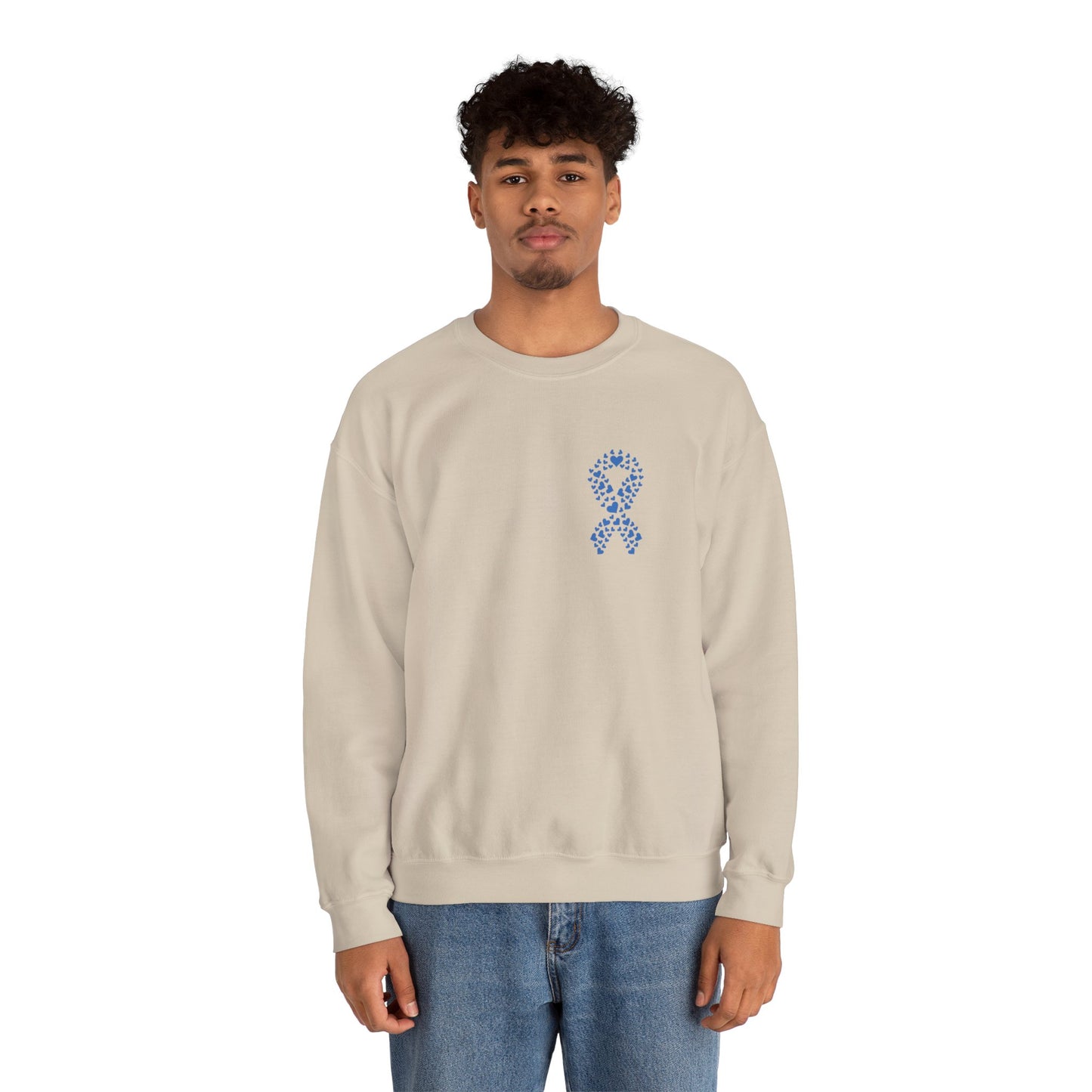 Man modeling sand diabetes awareness sweatshirt — soft unisex crewneck with blue heart ribbon supporting diabetes awareness.