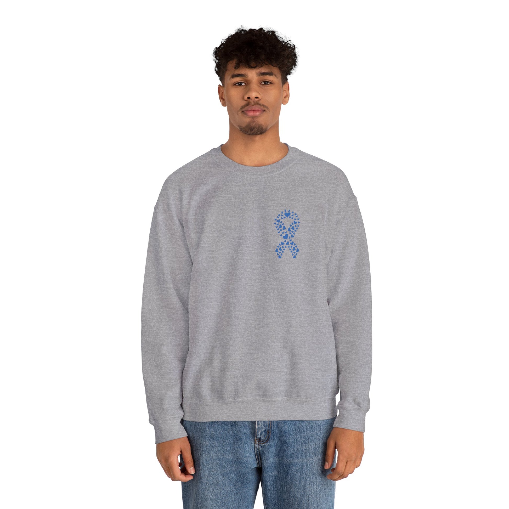 Man modeling sport grey diabetes awareness sweatshirt — unisex crewneck with blue heart ribbon symbolizing awareness and support.