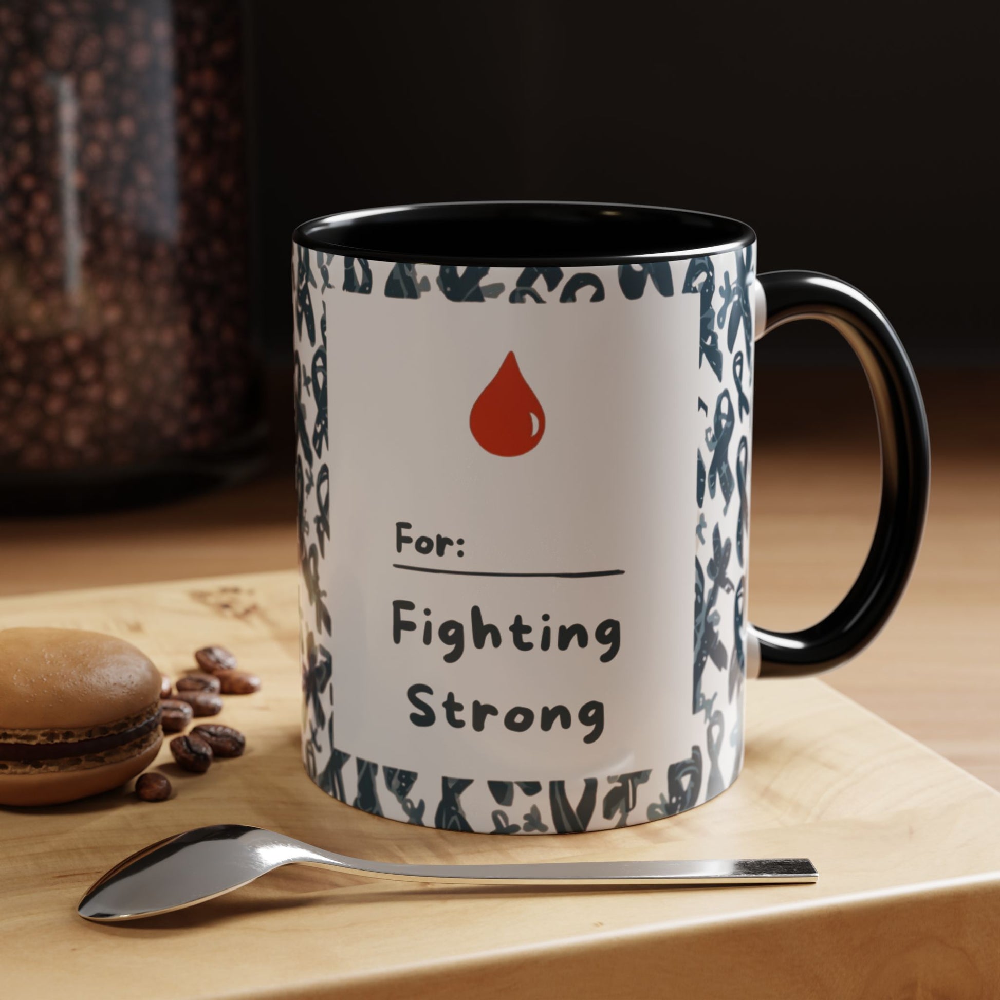 Black accent diabetes awareness mug on wooden counter — “For: Fighting Strong” design beside coffee and pastries symbolizing strength and wellness.