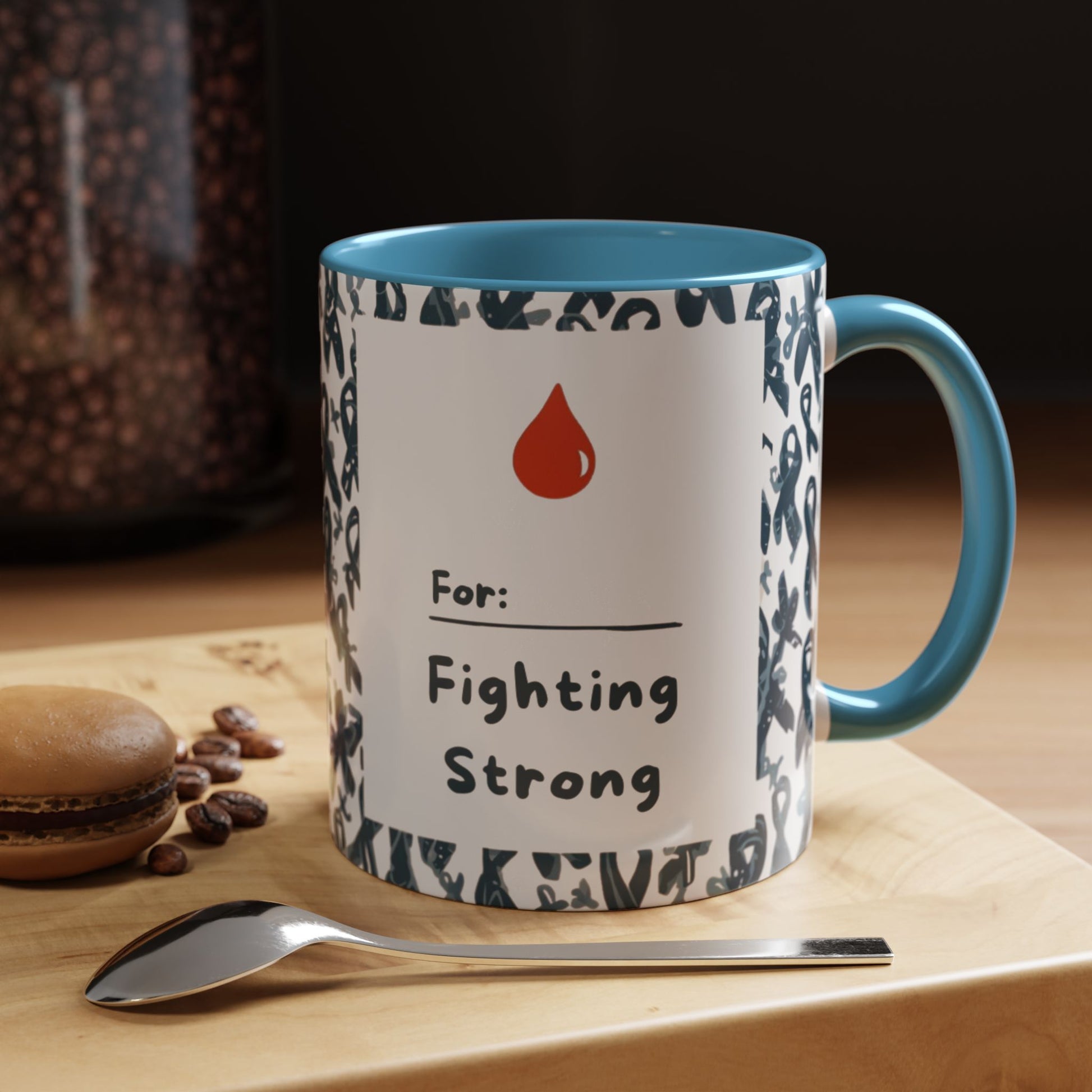 Light blue accent diabetes awareness mug on wooden table beside coffee and dessert — “For: Fighting Strong” design promoting hope and health awareness.