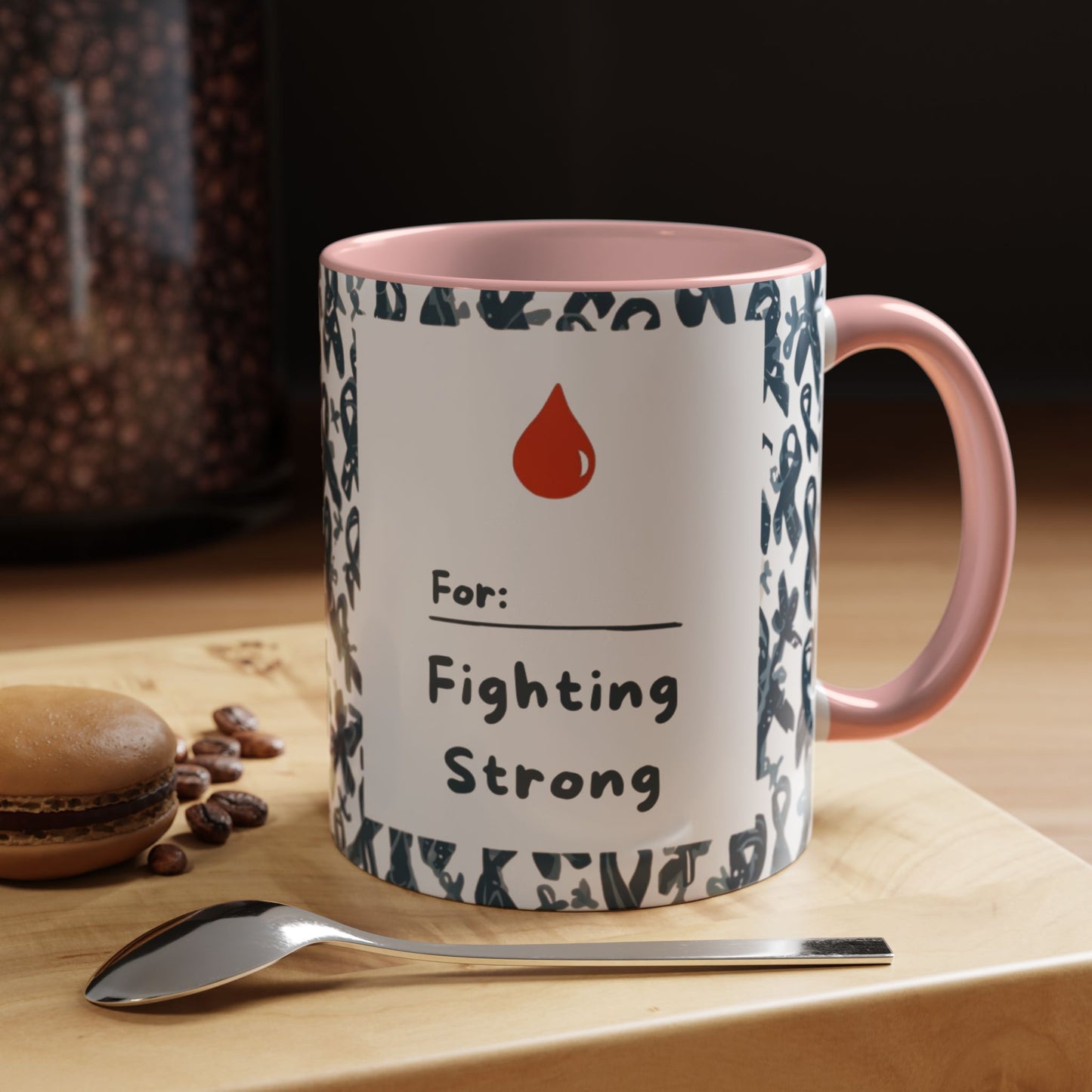 Light pink diabetes awareness mug on wooden table — “For: Fighting Strong” motivational coffee mug supporting diabetes awareness and empowerment.
