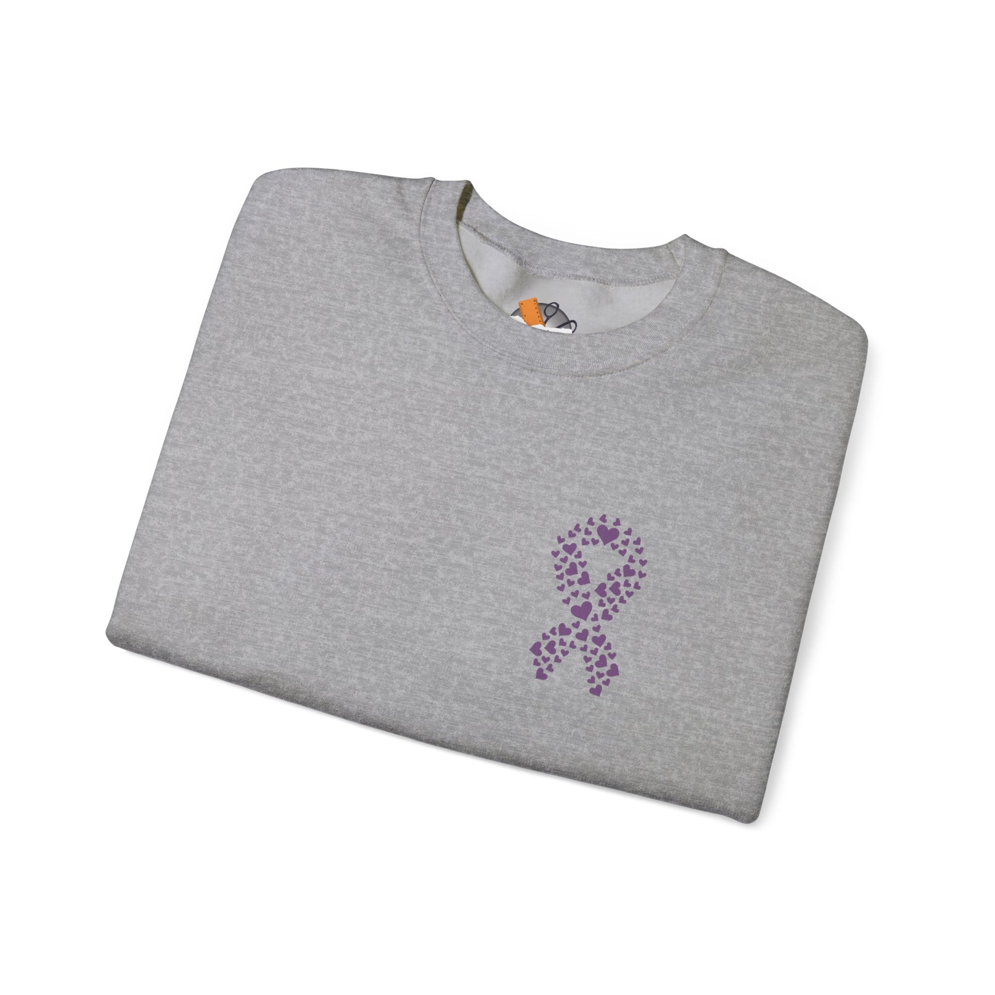 Folded athletic heather gray crewneck sweatshirt featuring purple heart-shaped ribbon design supporting domestic violence awareness, Makin’ It by Lady Ev.