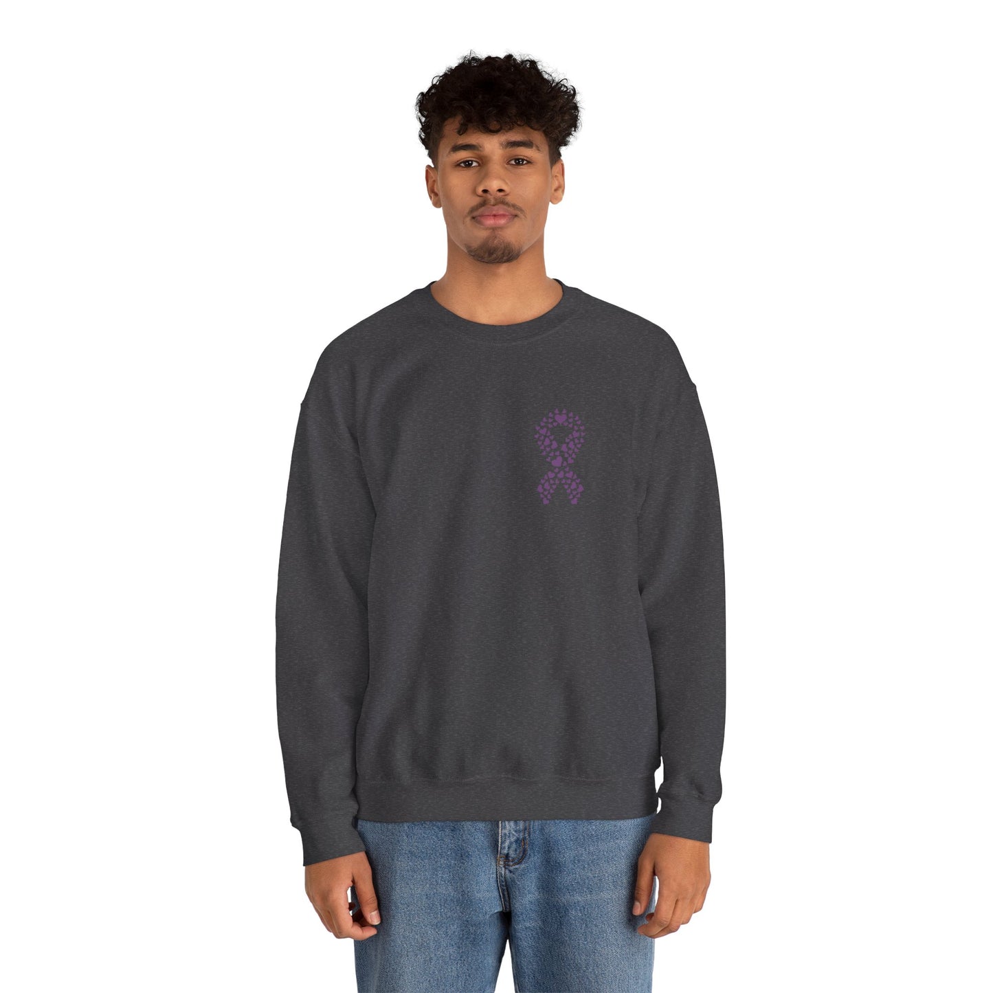 Man wearing charcoal gray domestic violence awareness crewneck sweatshirt featuring purple ribbon heart graphic, Makin’ It by Lady Ev.