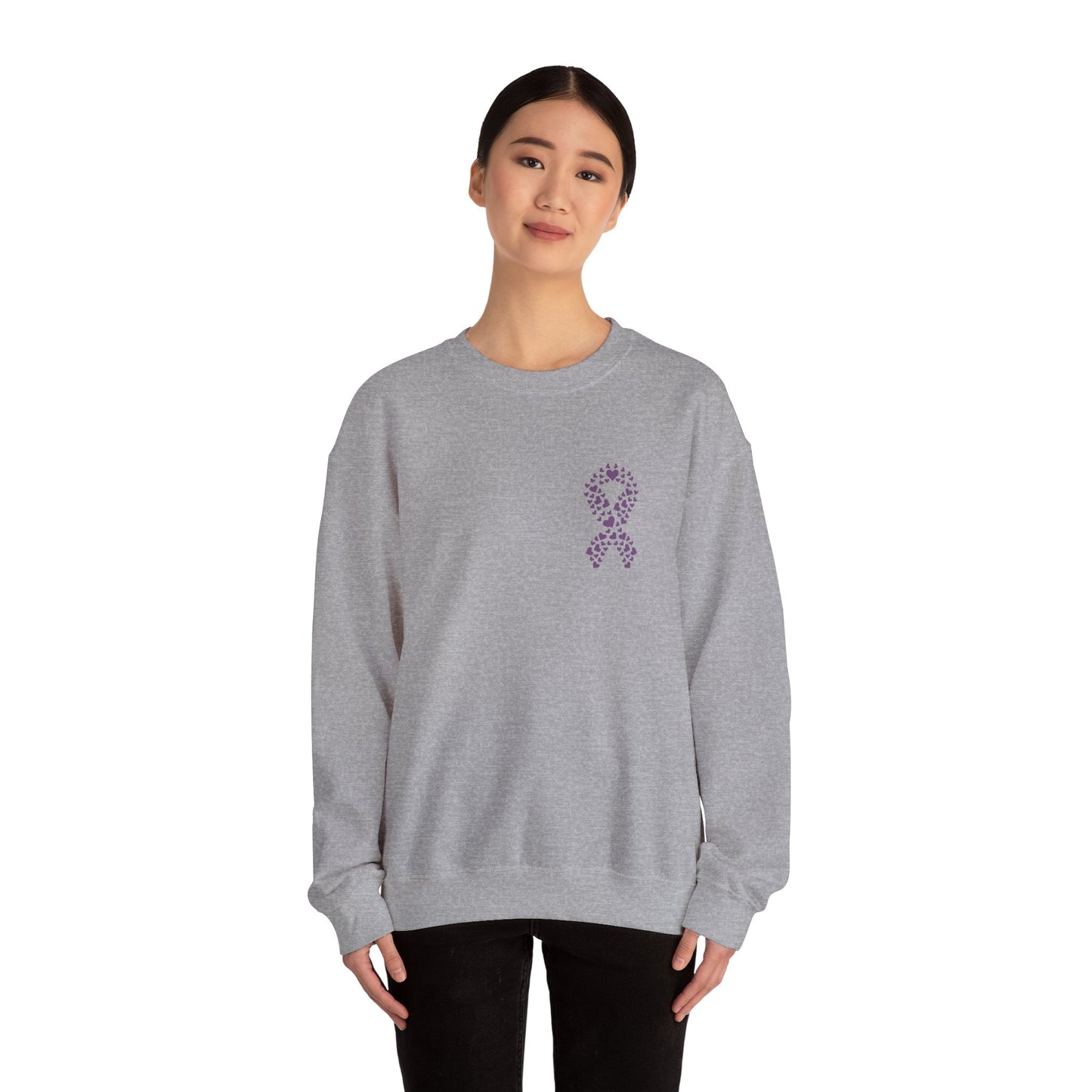 Woman wearing heather gray domestic violence awareness crewneck sweatshirt with purple heart ribbon design, Makin’ It by Lady Ev.