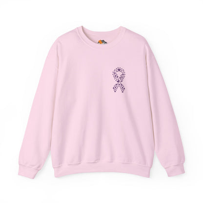 pink domestic violence awareness crewneck sweatshirt featuring purple heart-shaped ribbon design, Makin’ It by Lady Ev.