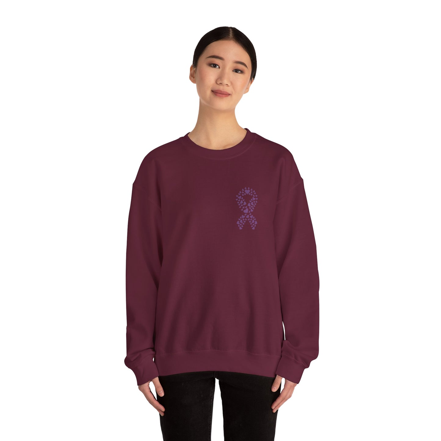 Woman wearing maroon domestic violence awareness crewneck sweatshirt with purple heart ribbon design, Makin’ It by Lady Ev.