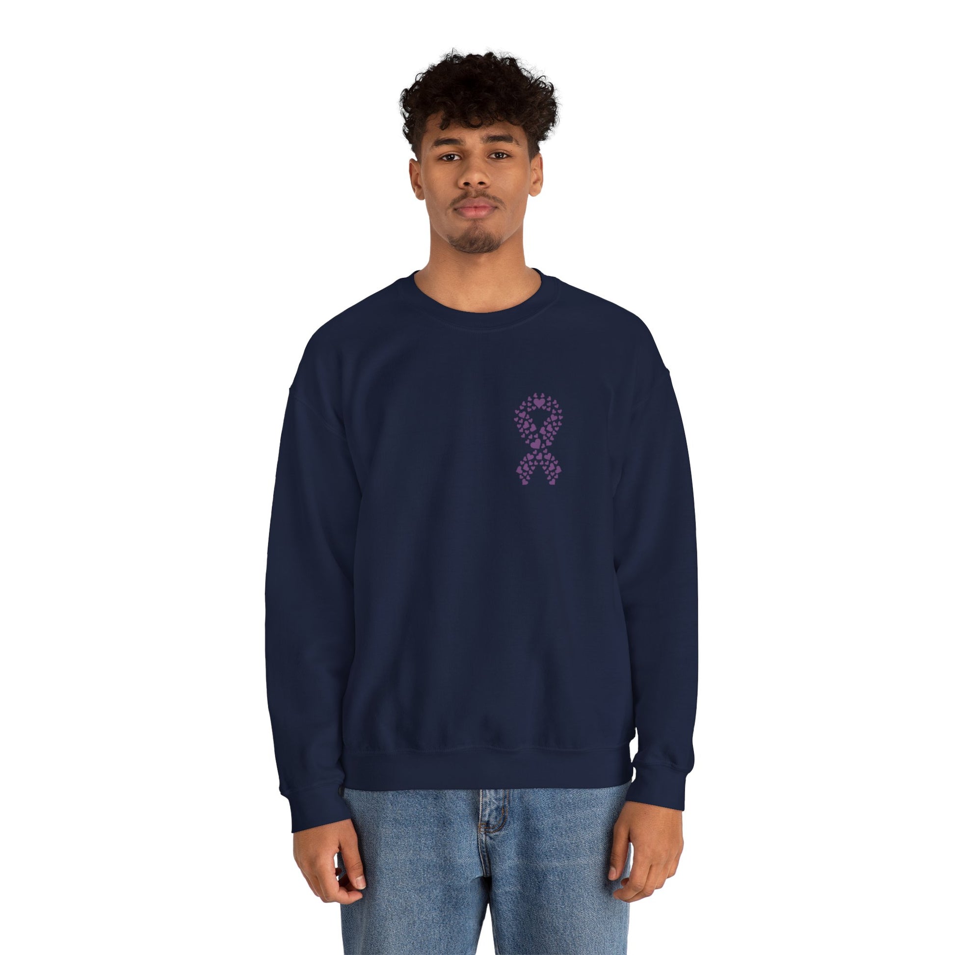 Man wearing navy blue domestic violence awareness crewneck sweatshirt featuring purple ribbon made of hearts, Makin’ It by Lady Ev.