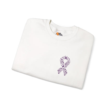 Folded white crewneck sweatshirt with purple heart ribbon design symbolizing domestic violence awareness, Makin’ It by Lady Ev.