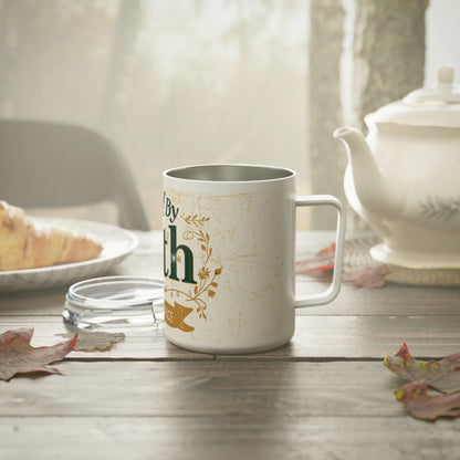 Fueled by Faith and Pumpkin Spice mug on wooden table with teapot — cozy fall morning scene featuring inspirational Christian drinkware.