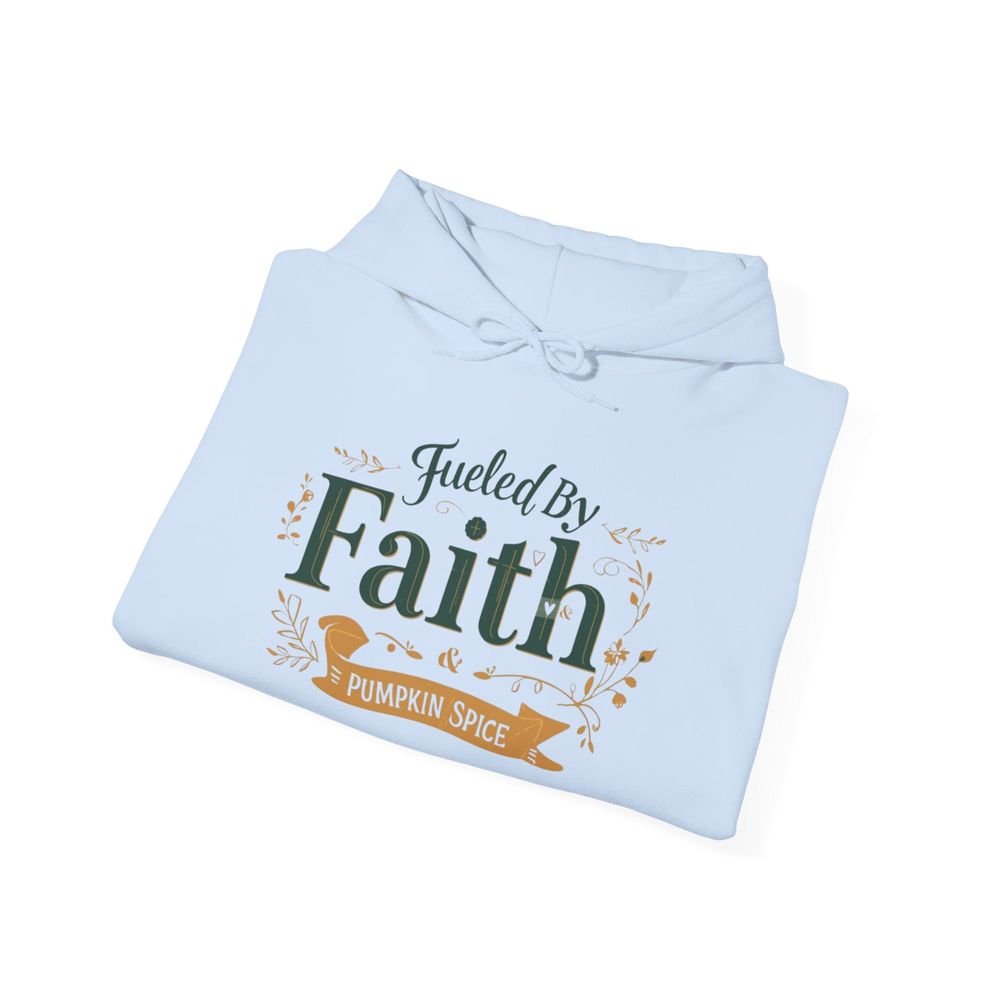 Folded light blue “Fueled by Faith & Pumpkin Spice” hoodie — cozy Christian fall sweatshirt with gold and green print.