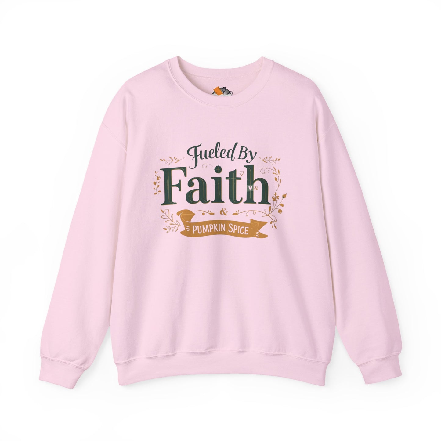 Light pink “Fueled by Faith & Pumpkin Spice” sweatshirt — feminine cozy Christian fall sweater with gold and green print.