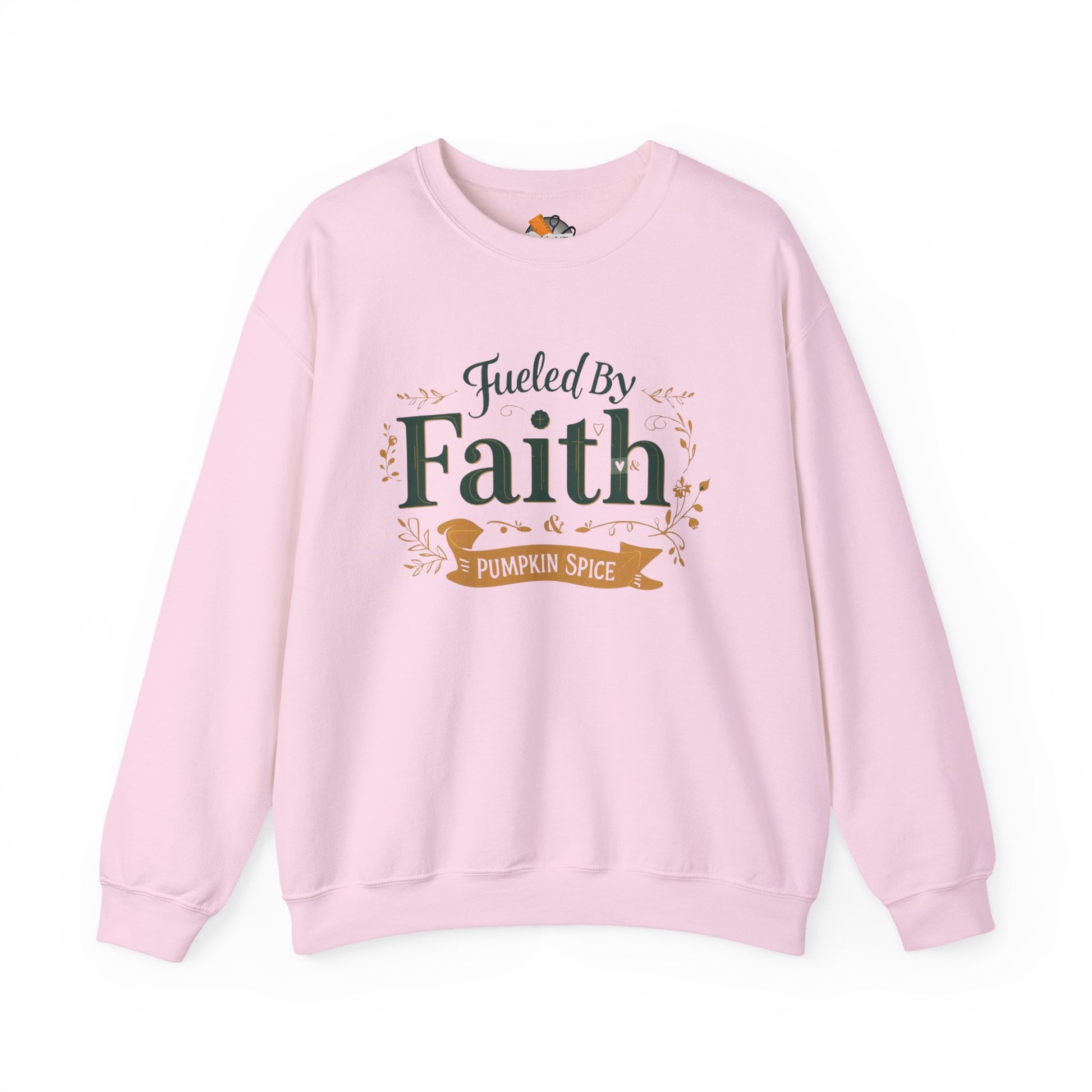 Light pink “Fueled by Faith & Pumpkin Spice” sweatshirt — feminine cozy Christian fall sweater with gold and green print.