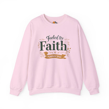 Light pink “Fueled by Faith & Pumpkin Spice” sweatshirt — feminine cozy Christian fall sweater with gold and green print.