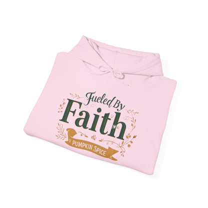Folded pink “Fueled by Faith & Pumpkin Spice” hoodie — cozy Christian fall apparel for women of faith.
