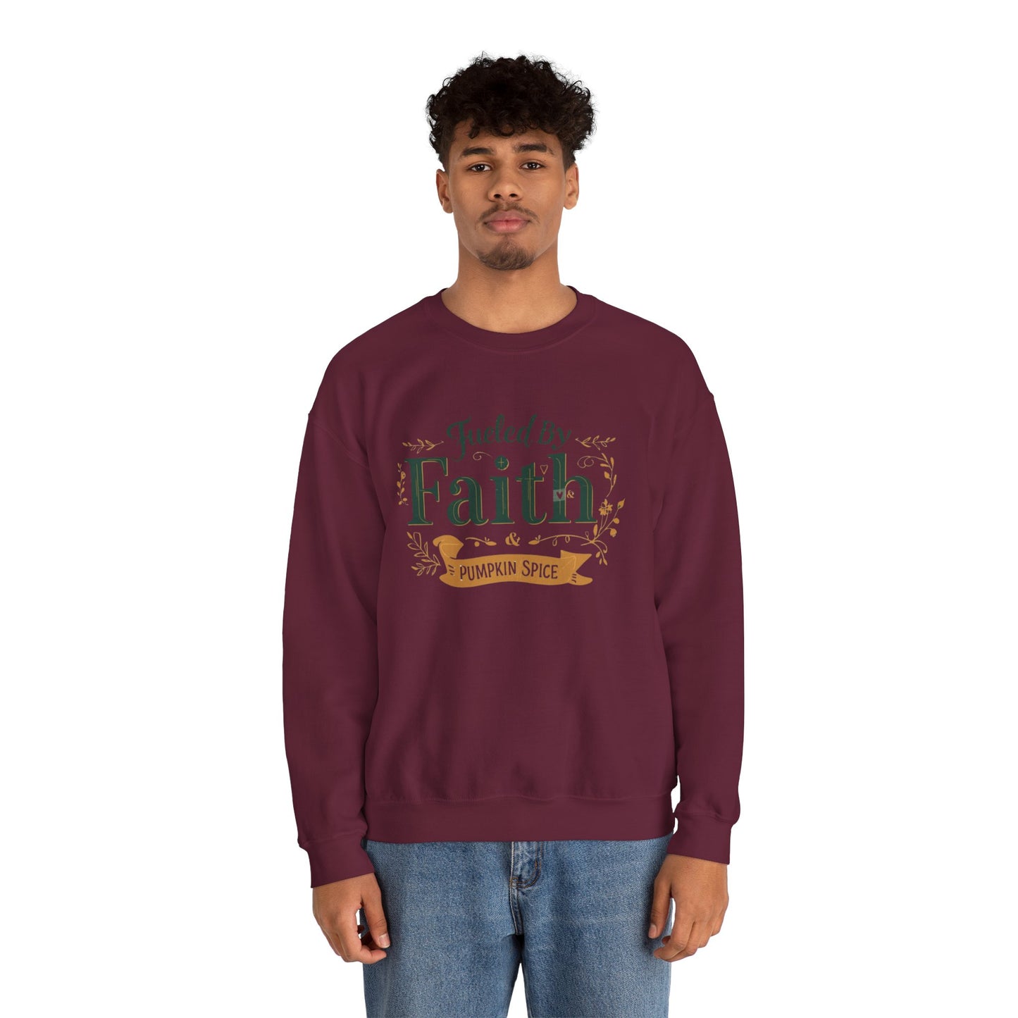 Man wearing maroon “Fueled by Faith & Pumpkin Spice” crewneck sweatshirt — unisex Christian faith-based fall fashion.