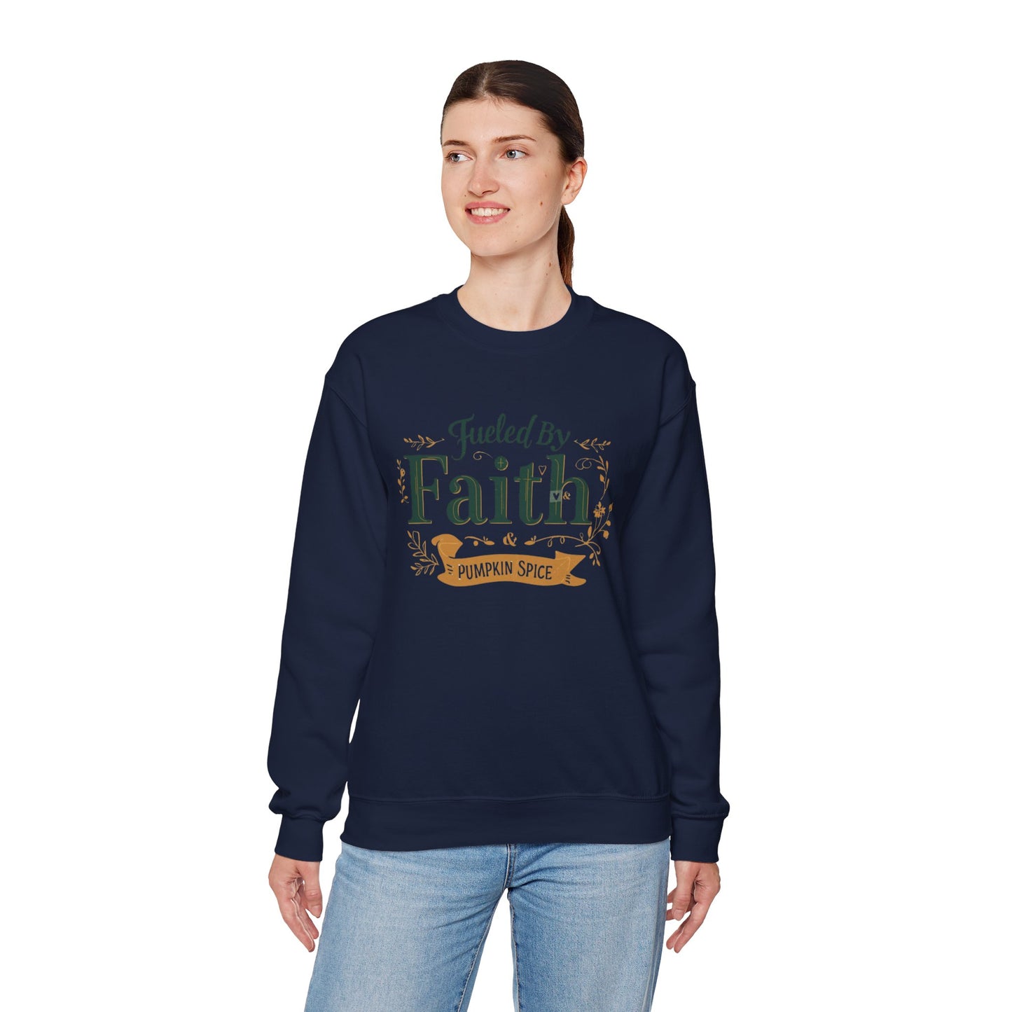 Woman wearing navy “Fueled by Faith & Pumpkin Spice” crewneck sweatshirt — comfortable unisex Christian fall outfit.