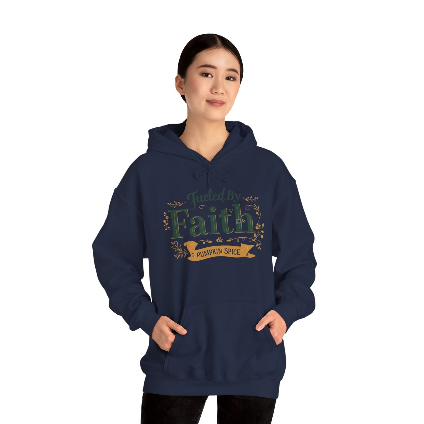 Woman modeling navy “Fueled by Faith & Pumpkin Spice” hoodie — cozy unisex Christian hoodie with faith-inspired fall message.