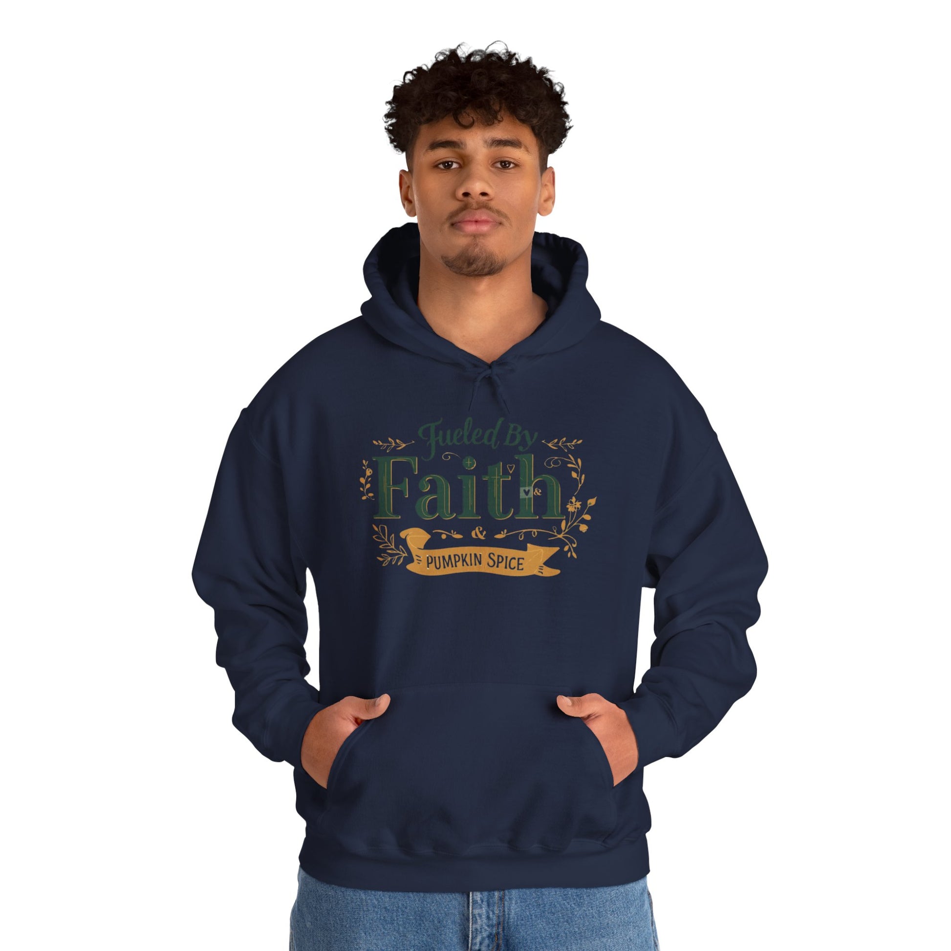 Man wearing navy “Fueled by Faith & Pumpkin Spice” hoodie — stylish Christian hoodie perfect for fall coffee moments.