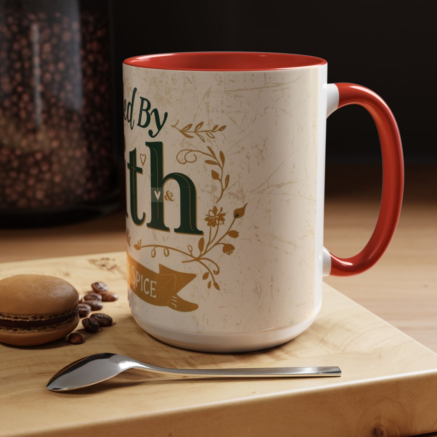 Lifestyle photo of red “Fueled by Faith & Pumpkin Spice” 15oz accent mug — faith-based Christian mug with fall-inspired design on wooden table.