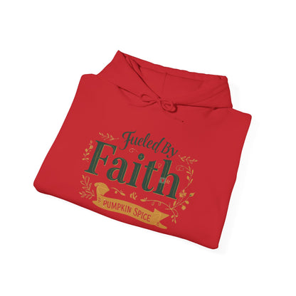 Folded red “Fueled by Faith & Pumpkin Spice” hoodie — cozy Christian fall apparel for coffee lovers and believers.