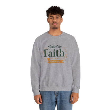 Man wearing sport grey “Fueled by Faith & Pumpkin Spice” crewneck sweatshirt — casual unisex Christian fall outfit for faith-filled style.