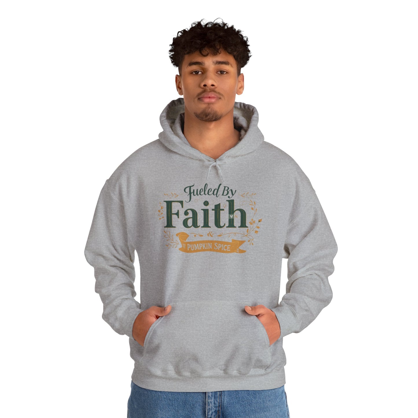 Man wearing sport grey “Fueled by Faith & Pumpkin Spice” hoodie — faith-inspired unisex hoodie for fall season style.