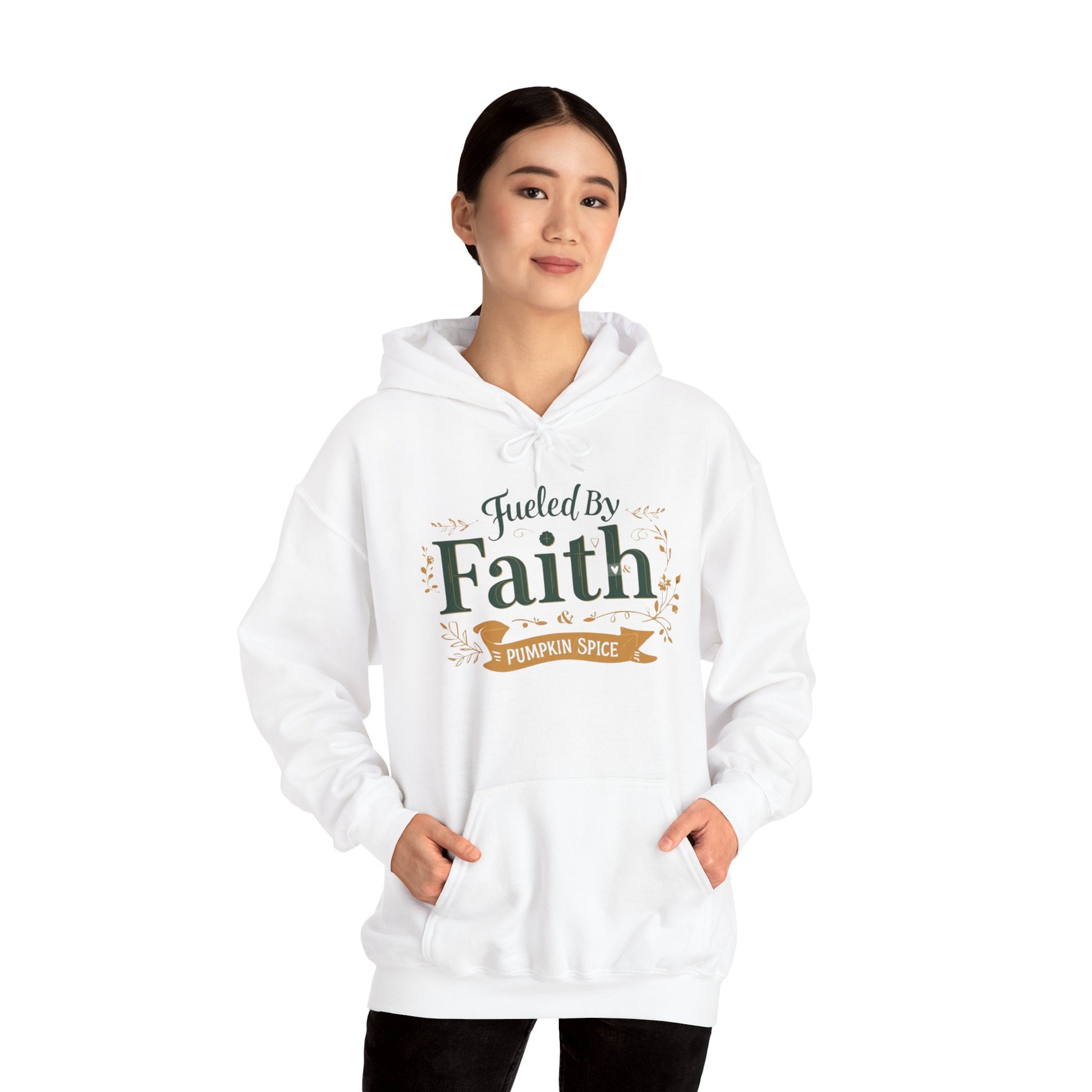 Woman modeling white “Fueled by Faith & Pumpkin Spice” hoodie — soft Christian hoodie for cozy fall days and pumpkin spice season.